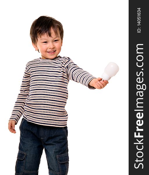 Portrait of happy child holding an energy efficiency light bulb isolated on white. Portrait of happy child holding an energy efficiency light bulb isolated on white.