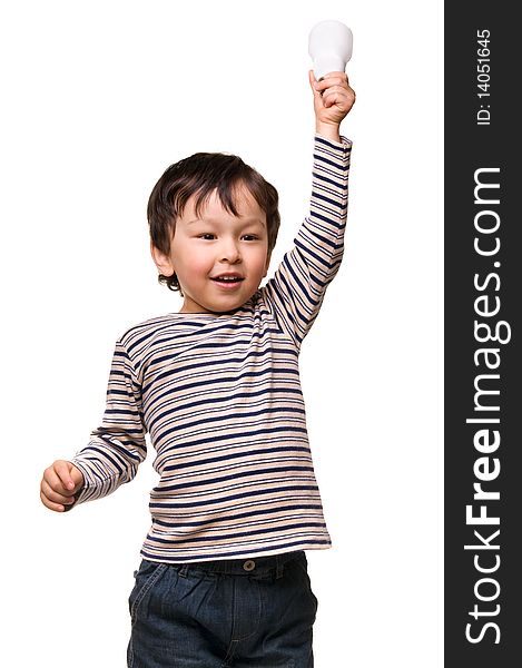 Portrait of happy child holding an energy efficiency light bulb isolated on white. Portrait of happy child holding an energy efficiency light bulb isolated on white.