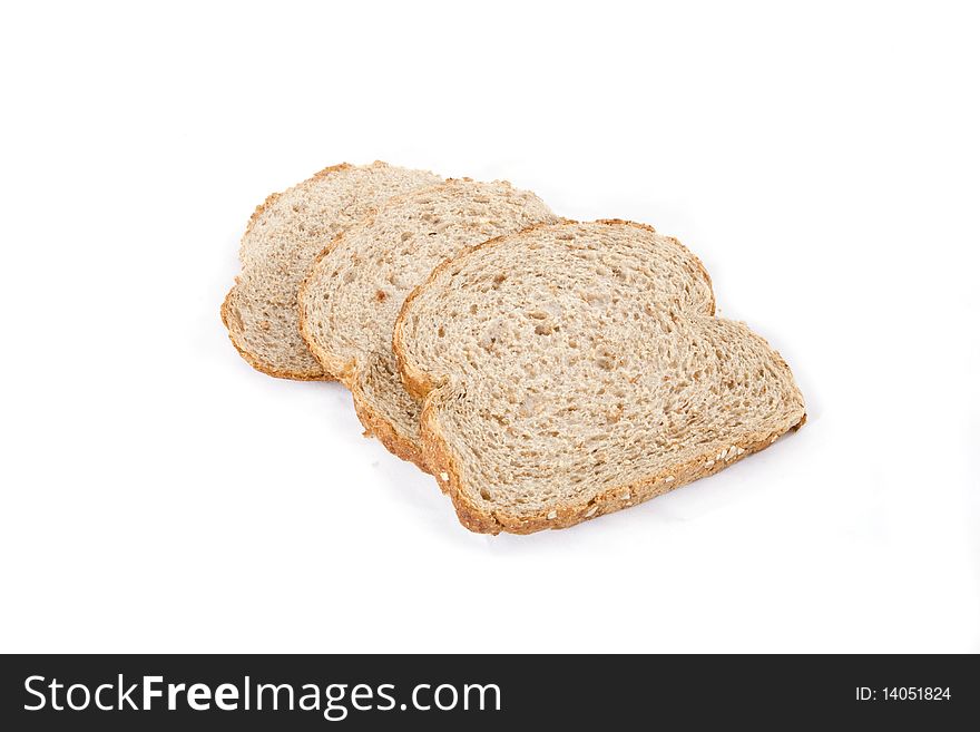 Three slices of bread on a white background. Three slices of bread on a white background