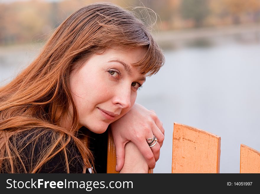 Portrait of  lady in black dress in the park