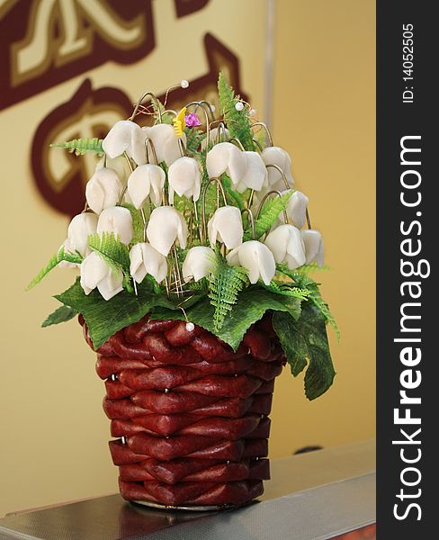 Edible bouquet of flowers made out of sausage and bacon. Edible bouquet of flowers made out of sausage and bacon