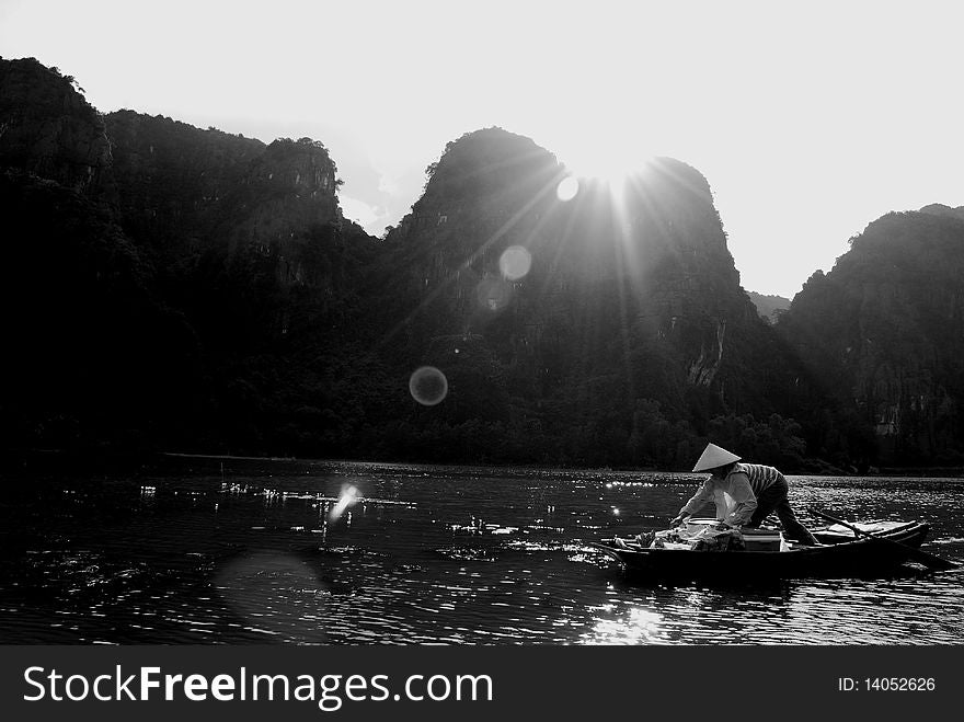 Boat rowing in Tam Coc, Vietnam. Boat rowing in Tam Coc, Vietnam