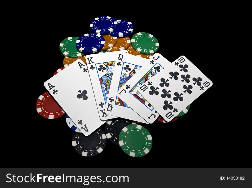 Hand of card player with royal flush and chips. Hand of card player with royal flush and chips