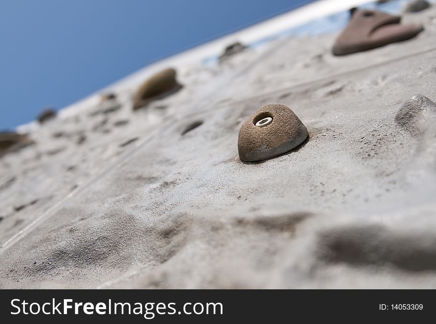 Climbing wall with grip handles. Climbing wall with grip handles