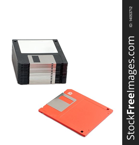 Stack Of Black Floppy Disks And One Red