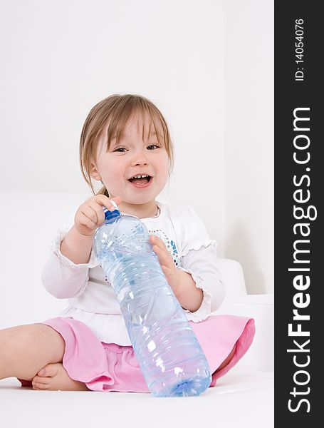 Happy little girl with water. Happy little girl with water