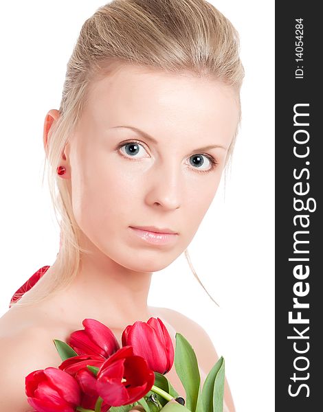 Young woman with bunch of tulip flowers. Isolated over white. Young woman with bunch of tulip flowers. Isolated over white