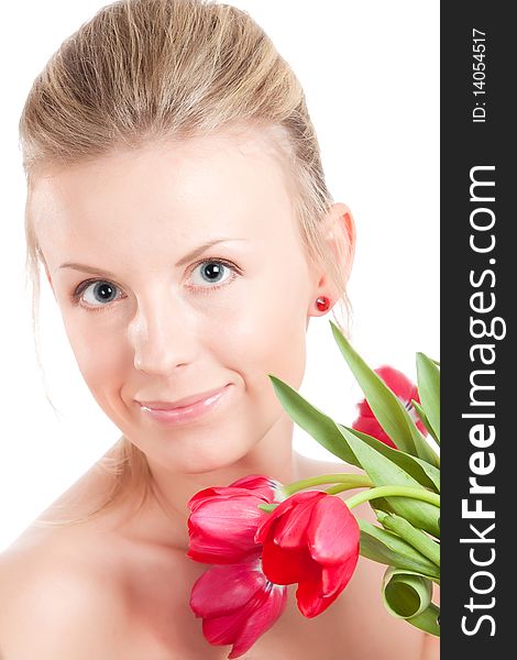 Young woman with bunch of tulip flowers. Isolated over white. Young woman with bunch of tulip flowers. Isolated over white