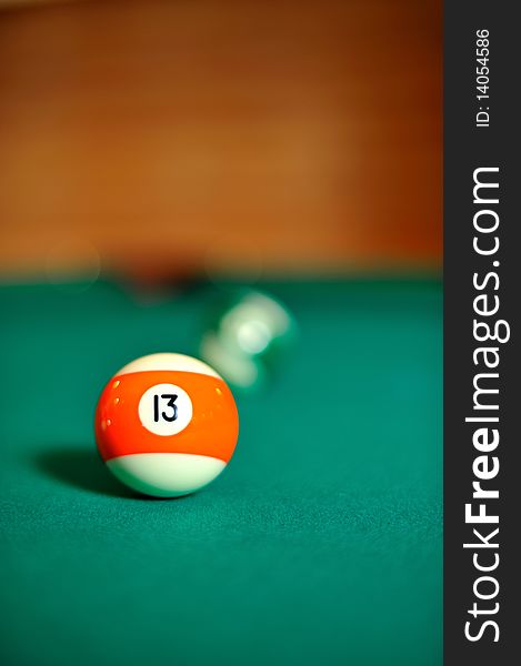 Billiard ball on the table. focus on the ball