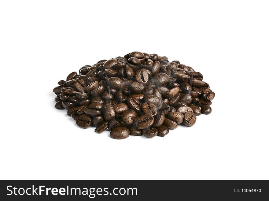 Seeds roasted coffee on a white background. Seeds roasted coffee on a white background.