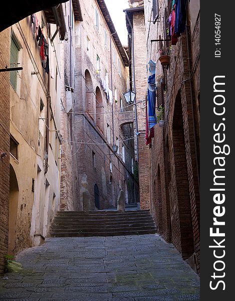 A narrow, steep street in Tuscany