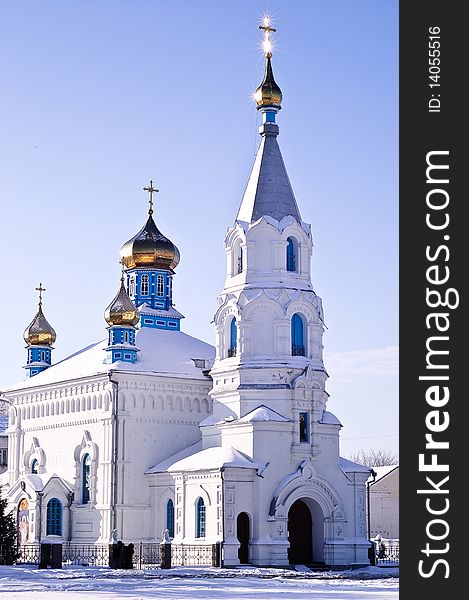 White church with gold domes. White church with gold domes