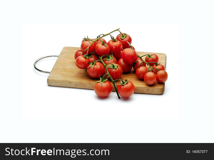 Cherry tomatoes on wood kitchen