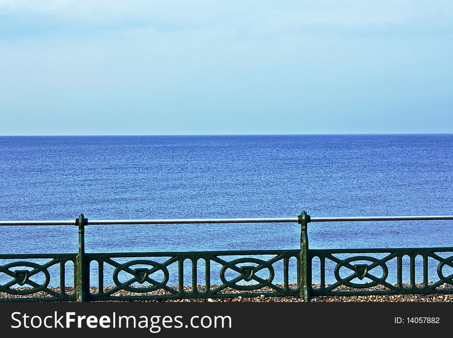 Iron railings with the sea in the background. Iron railings with the sea in the background