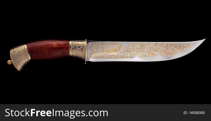 Beautiful knife with gold picture. Beautiful knife with gold picture