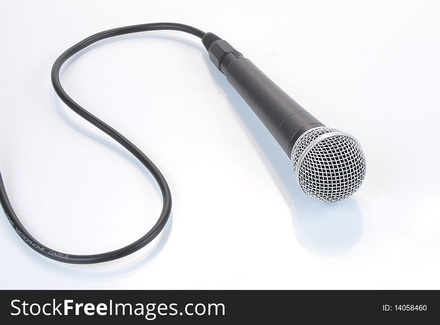 Picture of microphone on a grey background