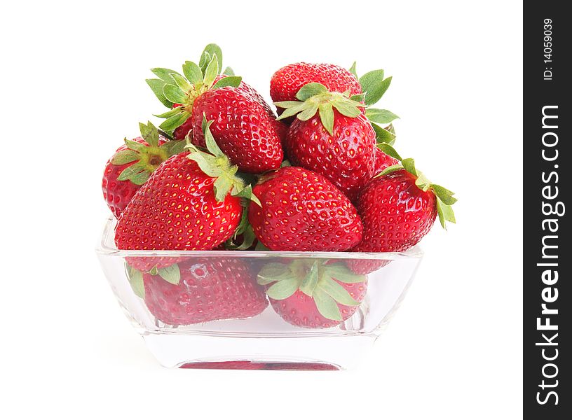 Bowl of fresh strawberries isolated on white background with path. Bowl of fresh strawberries isolated on white background with path