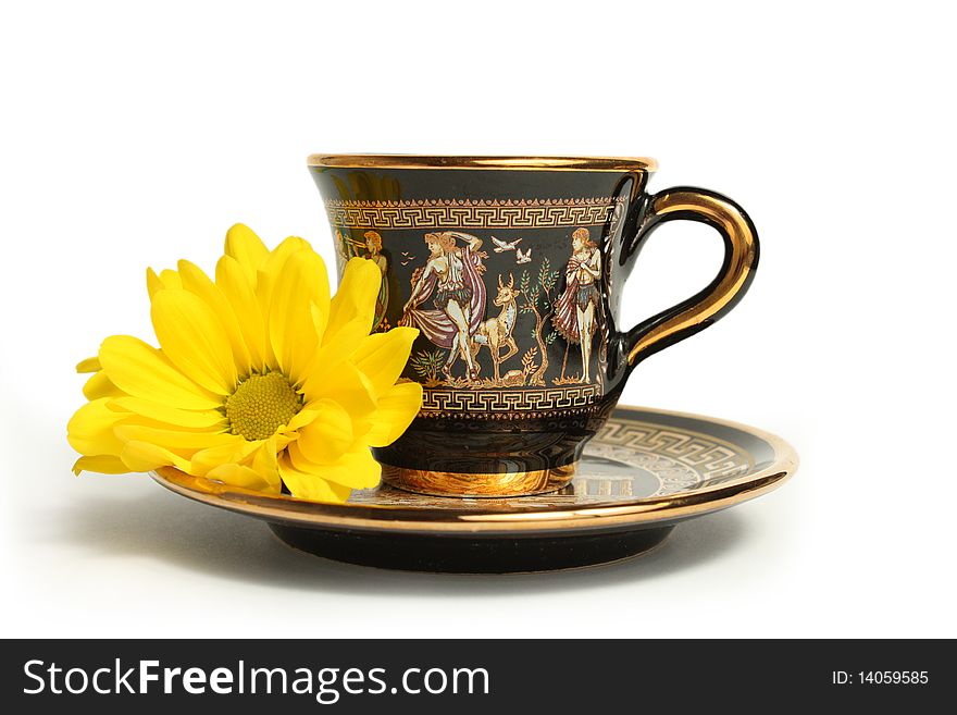 Elegant black cup with pattern from gilt