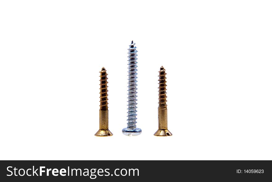 Three screws. Silver and gold. Isolated