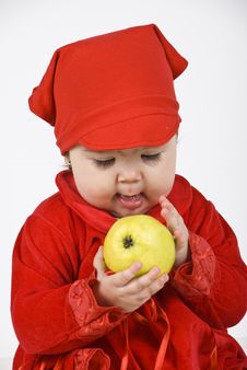 Baby Girl Holding And Caress An Apple Royalty Free Stock Photography Baby Girl Holding And Caress An Apple Royalty Free Stock Photography