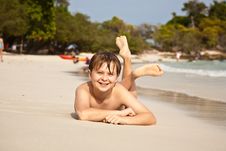 Happy Boy Lying At The Beach Stock Image Happy Boy Lying At The Beach Stock Image