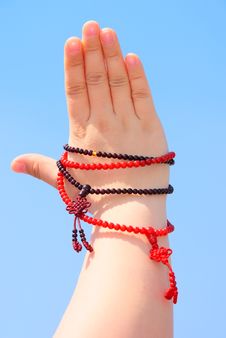 Prayer Beads In Her Hands Stock Images