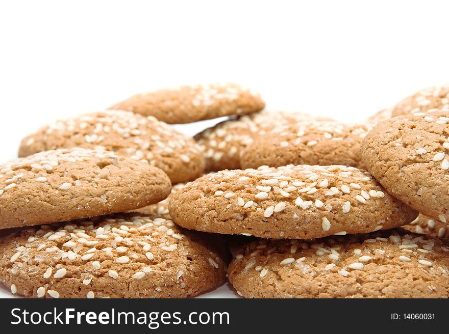 A pile of chocolate chip cookies isolated on a white background