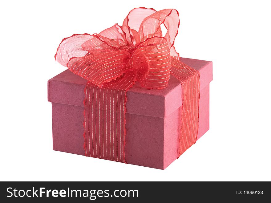 Red gift box with red bow isolated on white background. Red gift box with red bow isolated on white background