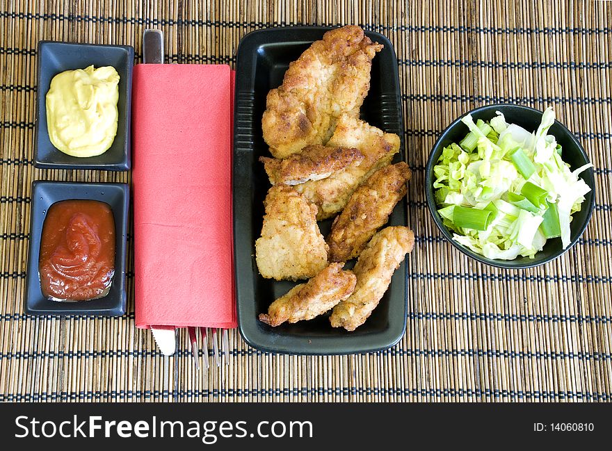 Chicken fingers and light salad for lunch. Chicken fingers and light salad for lunch