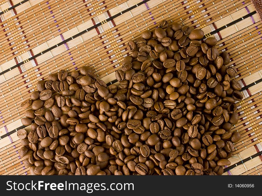 Coffee beans lying in a shape of heart. Coffee beans lying in a shape of heart