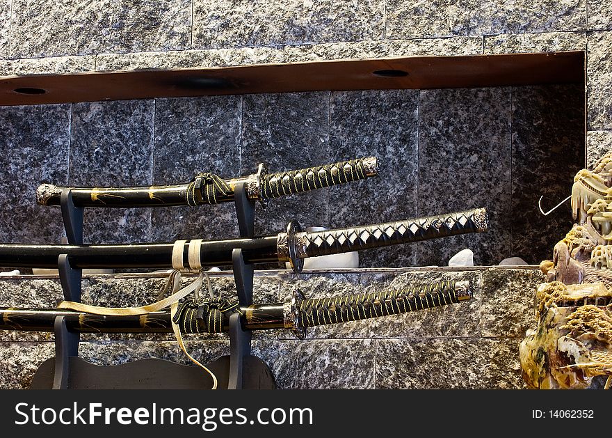 Katana, swords on a wooden podium