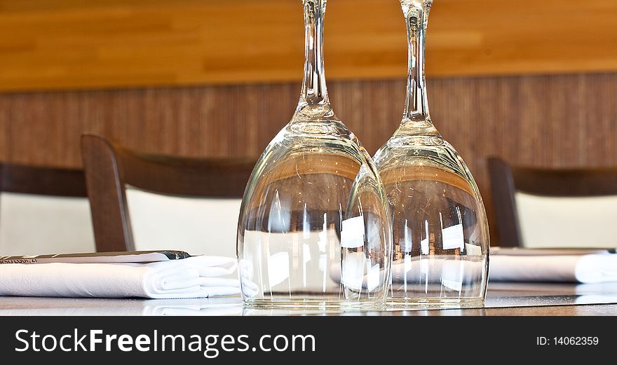 Glasses upside down on a restaurant table