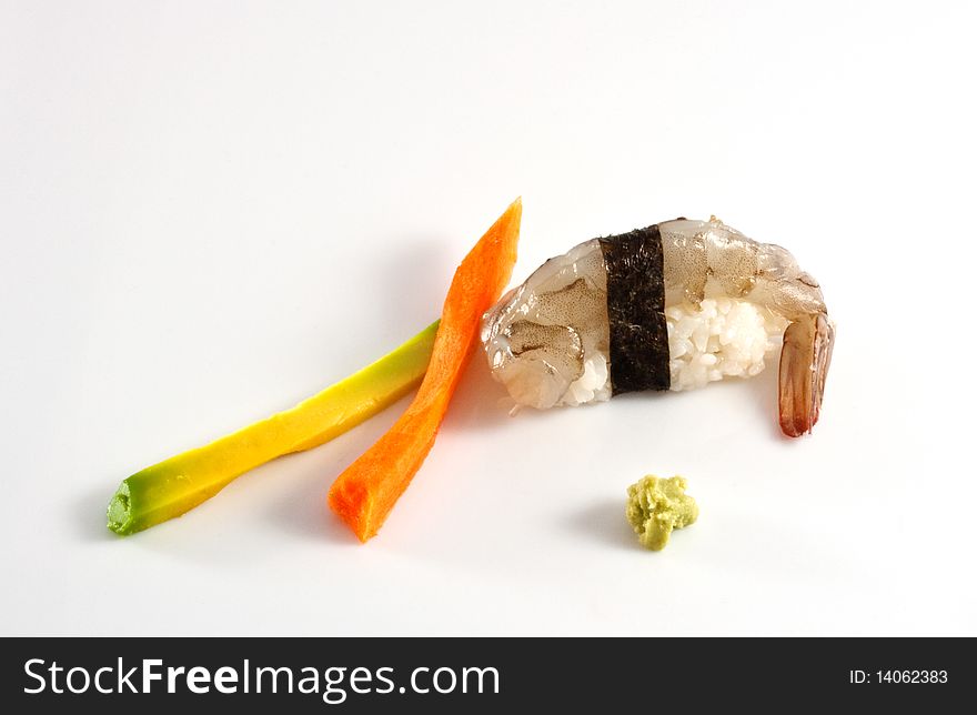 Sushi, shirmp nighiri with sliced of carrot and avocado  isolated on a white background. Sushi, shirmp nighiri with sliced of carrot and avocado  isolated on a white background