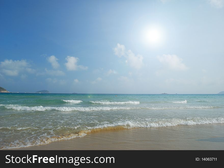 Waves on the beach with the sea background. Waves on the beach with the sea background