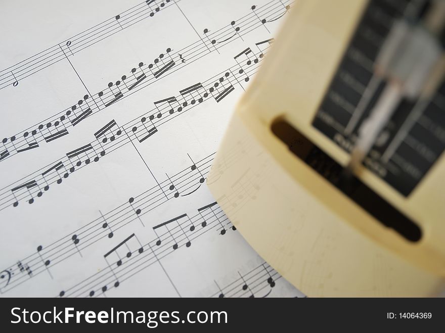 Music score and metronome
