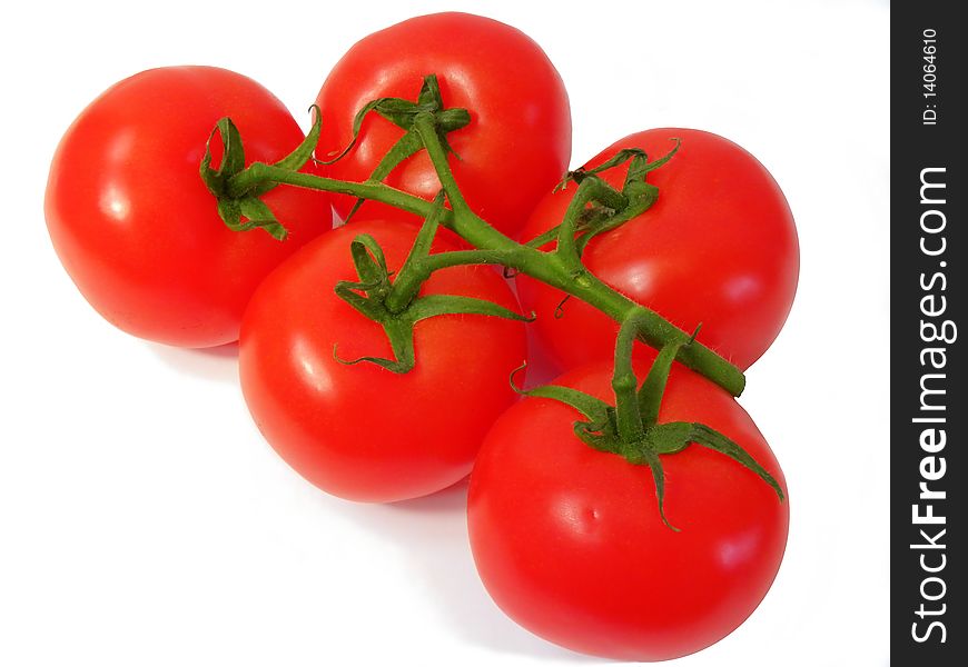 Juicy red tomatoes isolated on white background