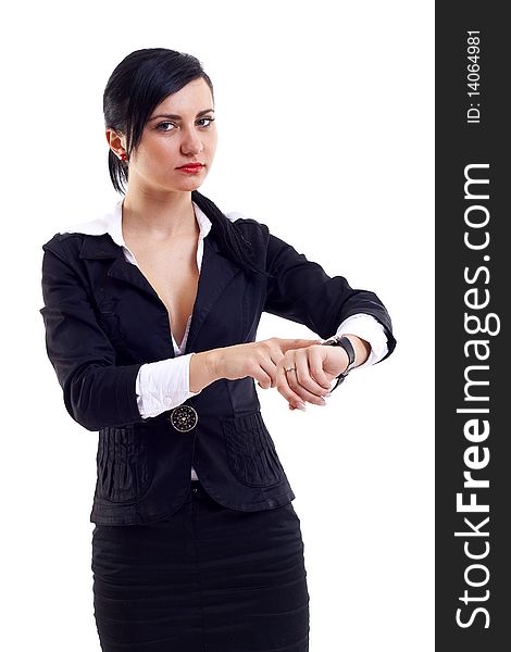 Attractive businesswoman checking time over white background