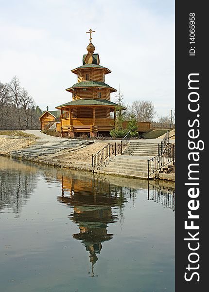 Belltower on the bank of a sacred source