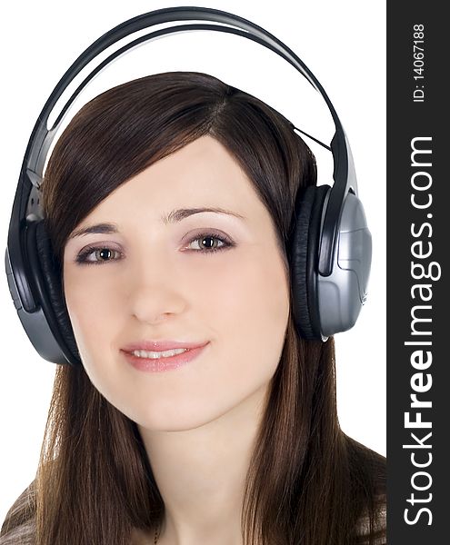 Young woman in headphones listening music