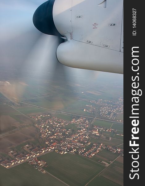 Houses and farms, fields and roads as seen from a plane. Houses and farms, fields and roads as seen from a plane