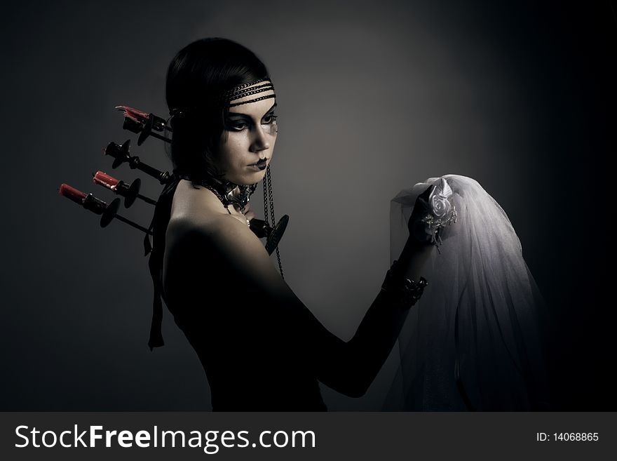 Woman with candelabrum and bridal in hands. Woman with candelabrum and bridal in hands
