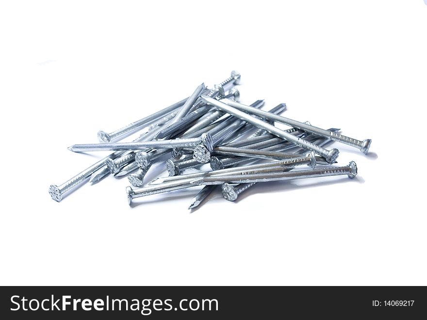 Pile of iron nails. Isolated on the white