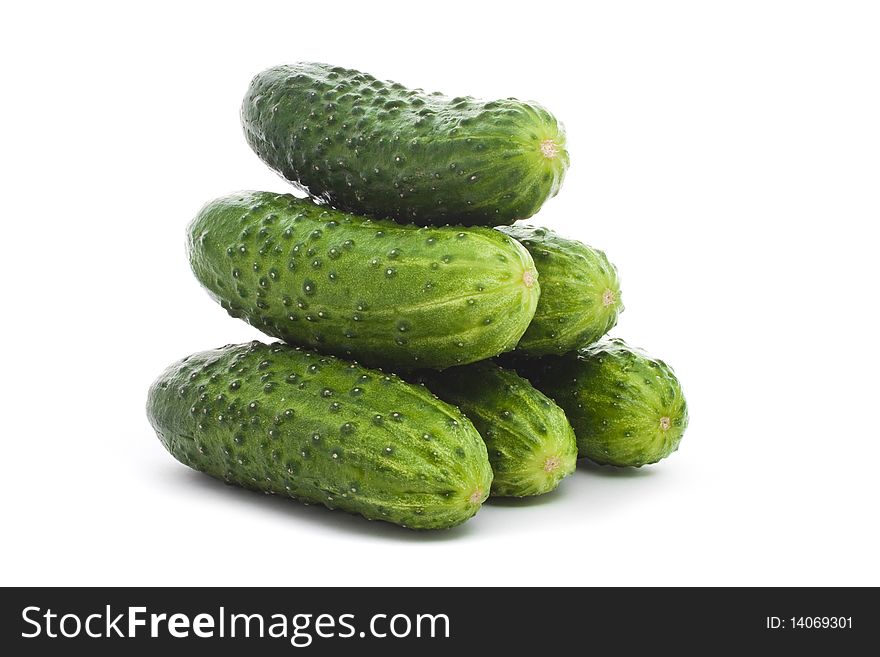 Five cucumbers isolated on white