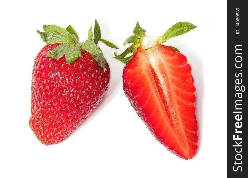 Juicy ripe strawberries isolated on white background