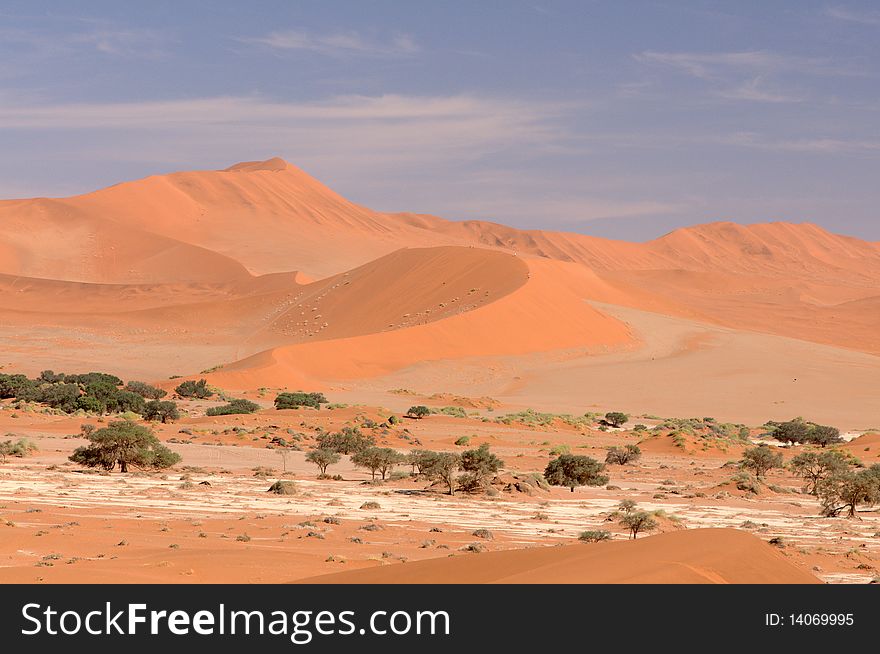 Sanddune landscape against blue sky, Namibia. Sanddune landscape against blue sky, Namibia