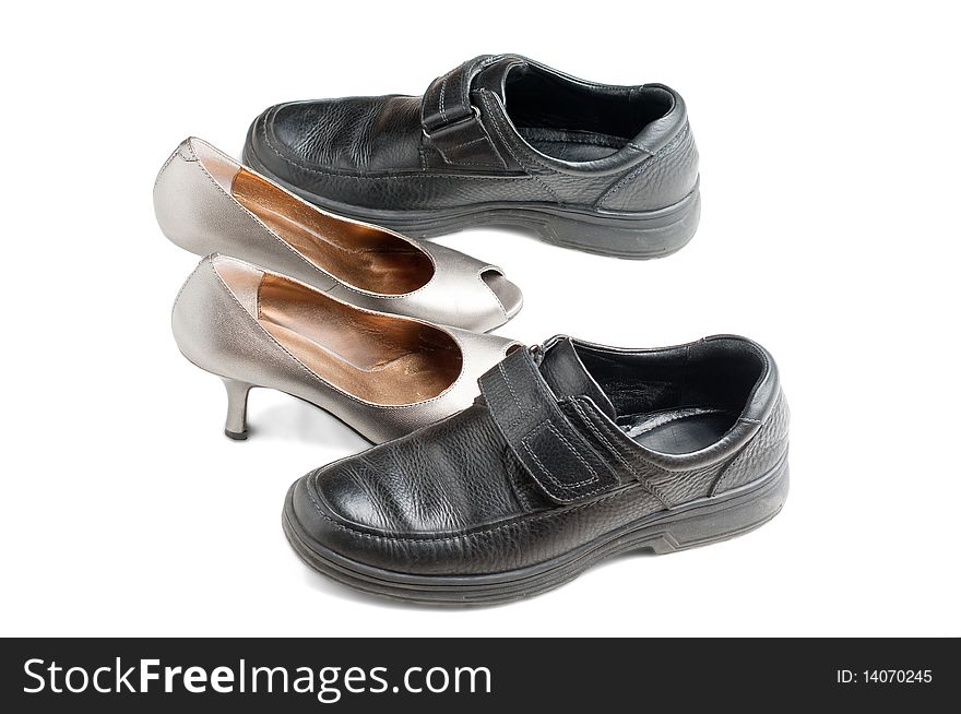 Relative place of men and women style shoes, seem to be two people hugging