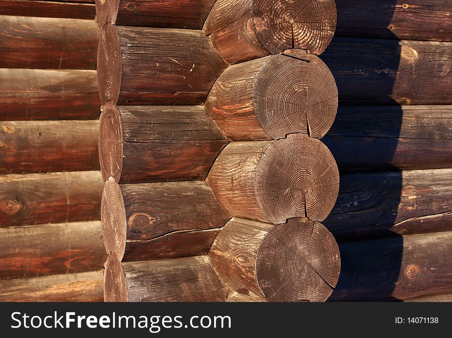 Fragment of a wall of the wooden house. Fragment of a wall of the wooden house