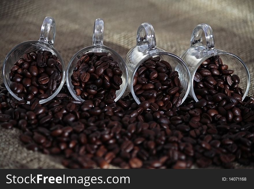 Coffee cups with coffee beans