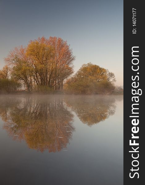 Reflection and mist on the river