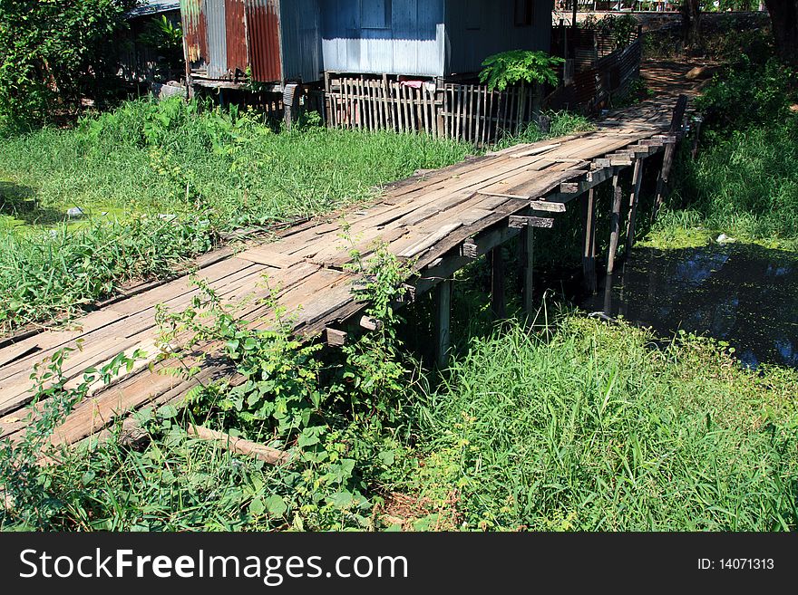 Old wooden bridge in forest